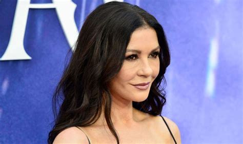 Catherine Zeta-Jones channels Morticia Addams in lace see-through dre ...