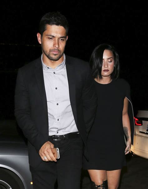 DEMI LOVATO and Wilmer Valderrama at Maestro’s Steakhouse in California ...