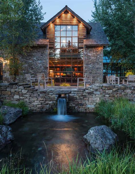 Rustic stone and timber dwelling overlooking the Grand Tetons