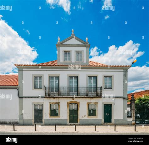 Facade of house in traditional Portuguese architecture style in the village of Azeitao, Portugal ...