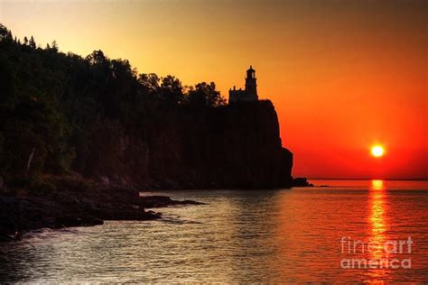 Split Rock Lighthouse - Sunrise Photograph by Wayne Moran