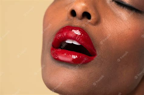 Premium Photo | Sensual black woman wearing a glossy red lipstick