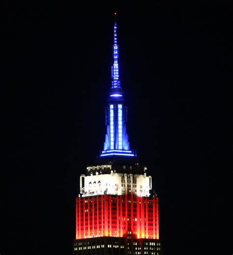 The Empire State Building is lit red, white and blue in me… | Flickr