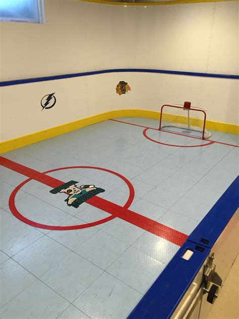 Basement hockey rink | Hockey room, Hockey themed room, Backyard hockey rink