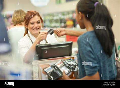 Female shop assistant uniform hi-res stock photography and images - Alamy