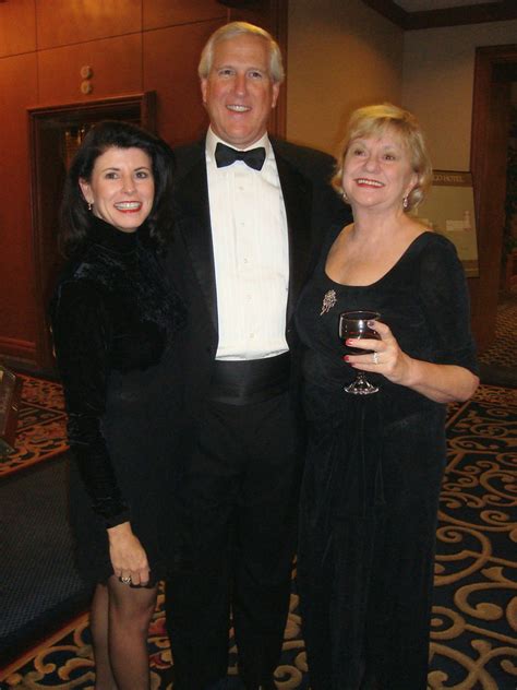 Former UGA Coach Ray Goff flanked by his girlfriend, Mary… | Flickr