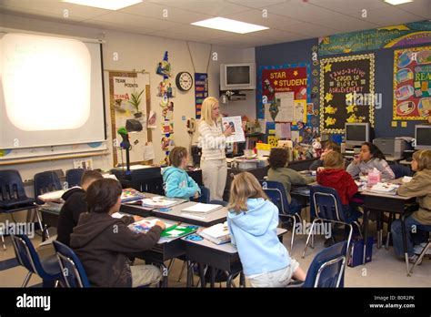 Fourth grade classroom with teacher and students in Tampa Florida Stock ...