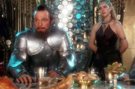 "Excalibur" movie still, 1981. L to R: Liam Neeson, Helen Mirren ...