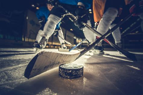 Close Up Of Ice Hockey Puck And Stick During A Match Stock Photo ...