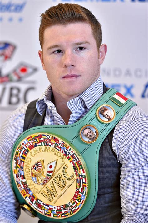 Canelo Alvarez presented with the WBC middleweight world championship belt