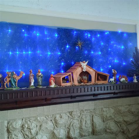 Nativity scene -- I made the twinkly night scene using mesh fabric ...