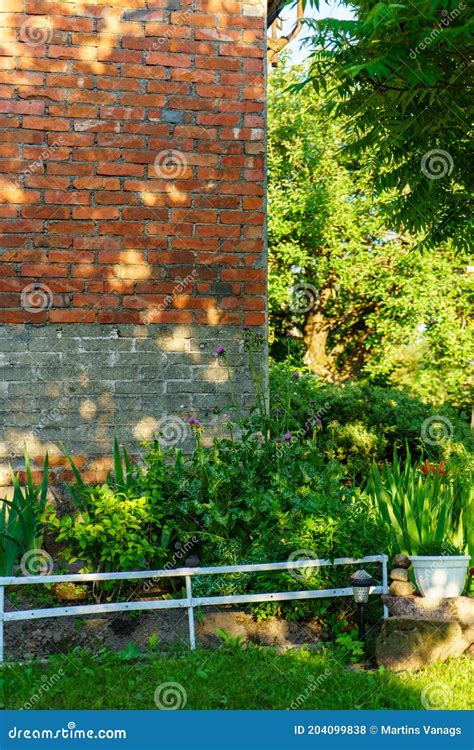 Old Building Interior with Wooden Planks and Brick Wall Stock Photo ...