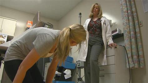 Dr. Carol Foster instructs how to properly do the Half Somersault Maneuver (credit: CBS ...