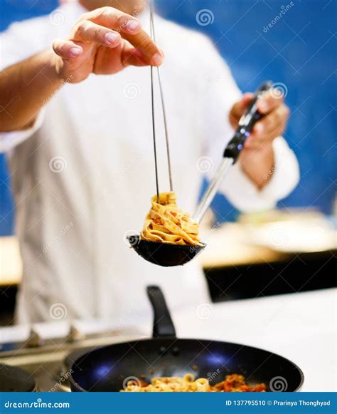 Chef Cooking Pasta, Chef Serves Spaghetti Carbonara on the Plate in the Kitchen Stock Photo ...