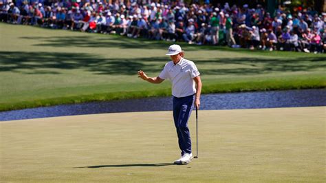 Cameron Smith of Australia reacts after a birdie attempt on the No. 15 green during the first ...