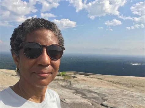 Peta on Top of Stone Mountain. Hiking up the backside of history, her… | by Billy Howard | Medium
