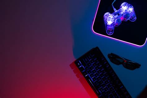 Free Photo | View of illuminated neon gaming keyboard setup and controller