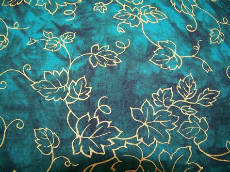 Fabric Teal Background with Gold Metallic by GabbysQuiltsNSupply