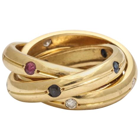 Vintage Cartier Ruby, Diamond and Sapphire Gold Trinity Ring For Sale at 1stdibs