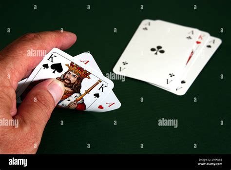 Full house at poker Stock Photo - Alamy