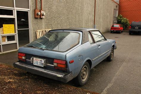 OLD PARKED CARS.: 1979 Datsun 310GX.