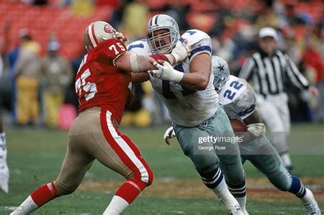 Offensive tackle Mark Tuinei of the Dallas Cowboys battles against... News Photo - Getty Images