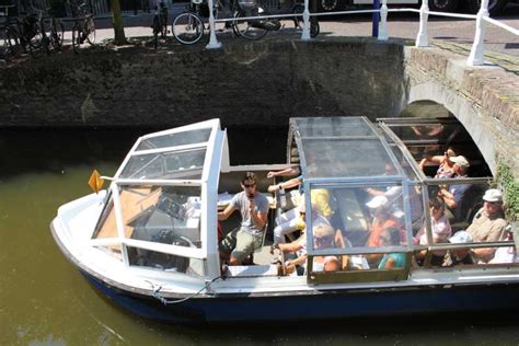 Delft: Canal Cruise with Guided Commentary | GetYourGuide