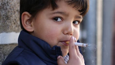 Portuguese town encourages children as young as five to smoke for Epiphany celebration