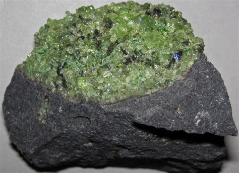 Peridotite mantle xenolith in phonotephrite (Peridot Mesa … | Flickr