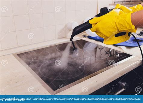 Cleaning Kitchen Hob with a Steam Cleaner. Stock Photo - Image of steam ...