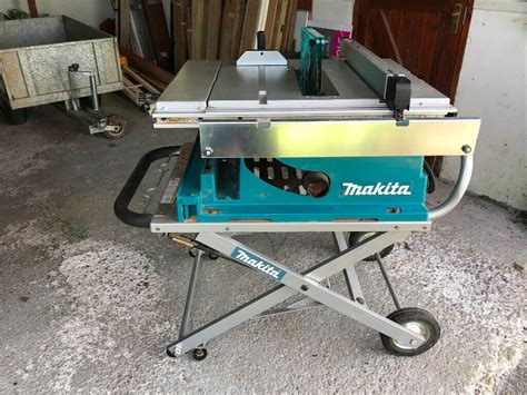 Makita Saw Table Model 2704 on collapsible stand. Excellent condition with two new blades. | in ...