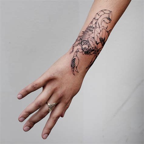 Fine Line Tattoo Artist Creates Detailed Black Ink Tattoo Art