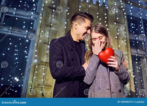 Loving Couple with Heart in Hands Outdoors. Stock Photo - Image of ...