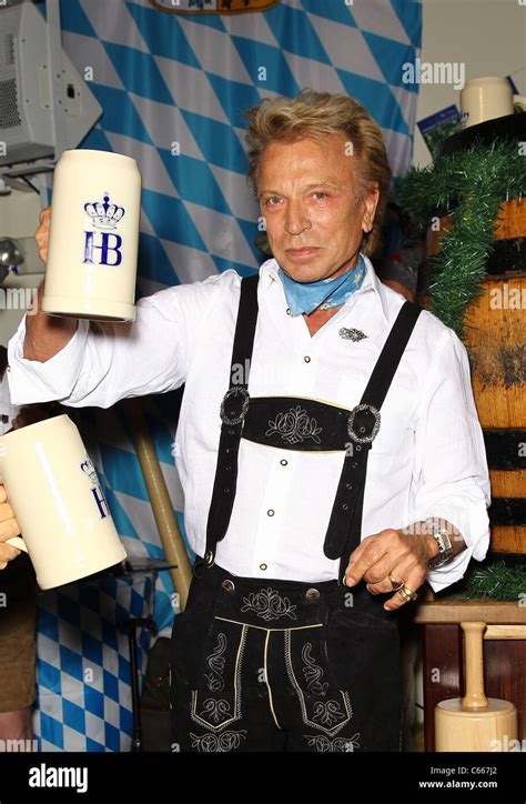 Siegfried Fischbacher in attendance for Siegfried Fischbacher taps the first keg of Oktoberfest ...