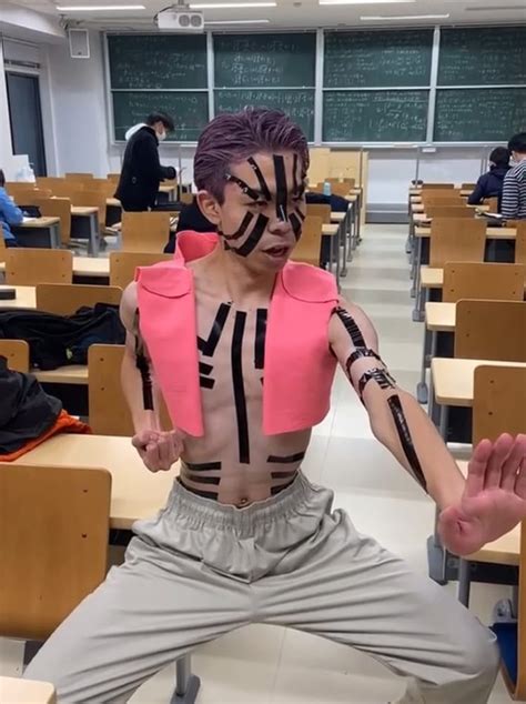 Japanese college student explains physics while cosplaying as demon Akaza from Demon Slayer ...