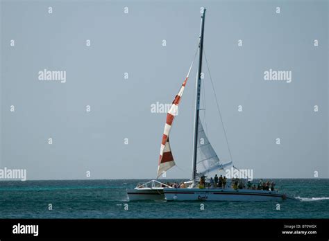 Red sail sports catamaran aruba hi-res stock photography and images - Alamy