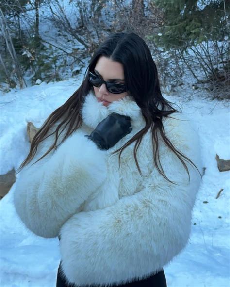 Kendall Jenner Dons a Soft Smile While Keeping Warm in a White Faux Fur ...