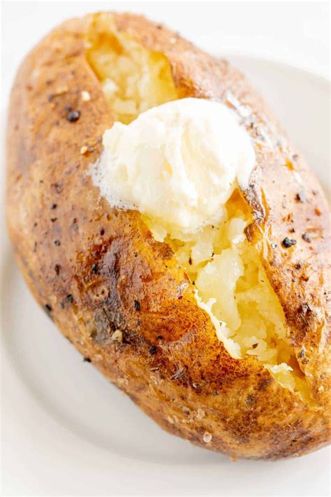 The Easiest Grilled Baked Potatoes in Foil | Julie Blanner | Fun easy recipes, Grilled baked ...