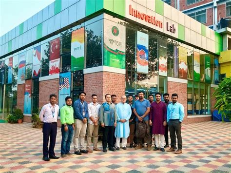 a group of men standing in front of a building