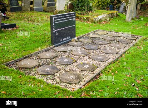 Twenty-one numbered plots at a graveyard plot Stock Photo - Alamy