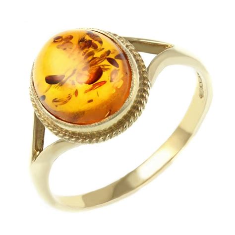 9ct yellow gold 10mm x 8mm oval amber ring - Jewellery from Mr Harold and Son UK