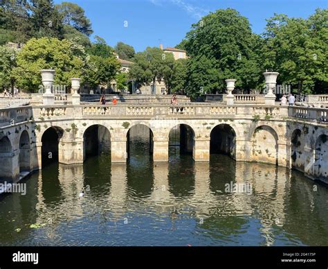 Les Jardins de la Fontaine, the channel with the water jet in Nimes ...