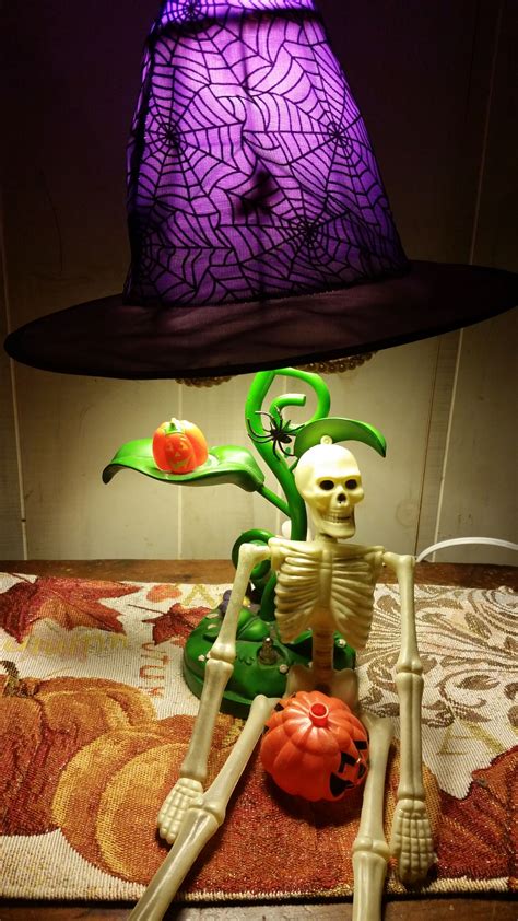 DIY Halloween Lamp. Dollar store witches hat makes a great lamp shade ...