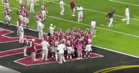 Landon Dickerson warming up during pregame with Alabama