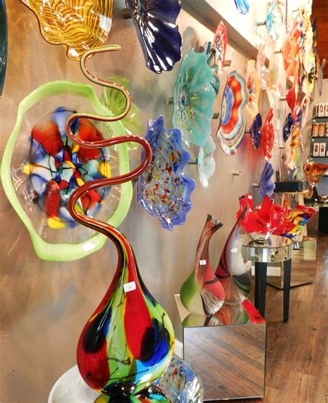 Our unique hand blow glass wall art and vases will add color and drama ...