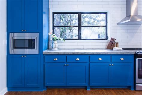 Modern White Kitchen with Blue Cabinets | HGTV