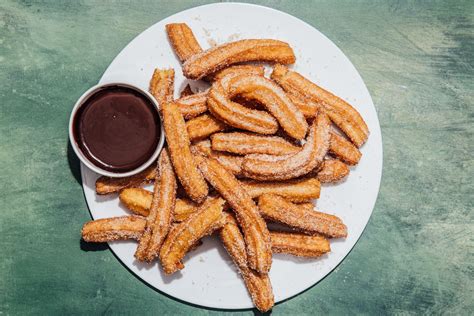 Churros with Bittersweet Chocolate Sauce | Bon Appétit