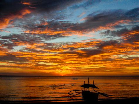 Sunset with pump boats in the Philippines [OC] | Sunrise images, Philippines beaches, Visit ...