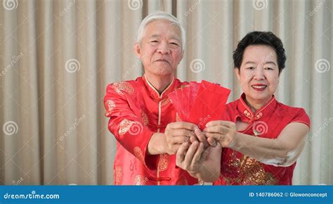 Asian Chinese Senior Couple New Year Red Envelop Happy Festival Stock Photo - Image of packet ...