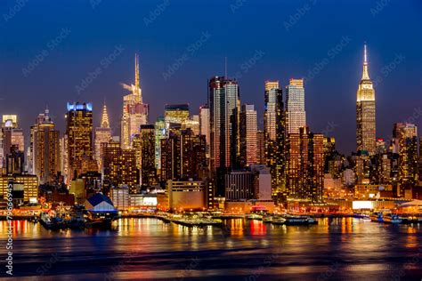 New York City night skyline Manhattan buildings midtown Stock Photo ...